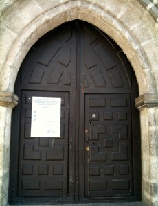 poster taped to church door