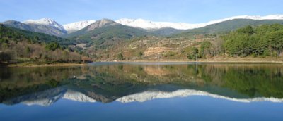 Gredos mountains reflected in reservoir