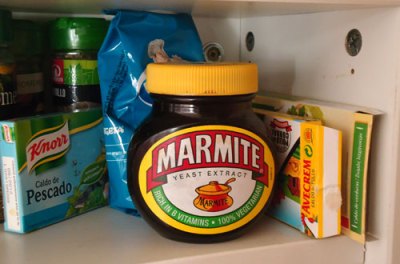 Marmite & stock cubes Jar of marmite & assorted stock cubes on kitchen shelf