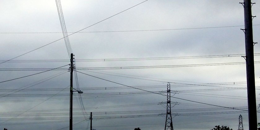 electricity cables against winter sky
