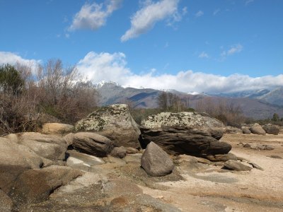 rocks on the shore of embalse Rosarito, reservoir Spain