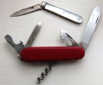 swiss army knife and pearl-handled penknife