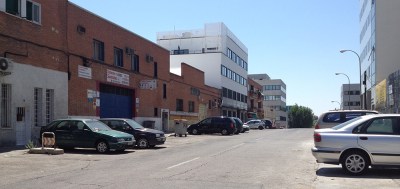 parked cars in bright mid-day sunshine