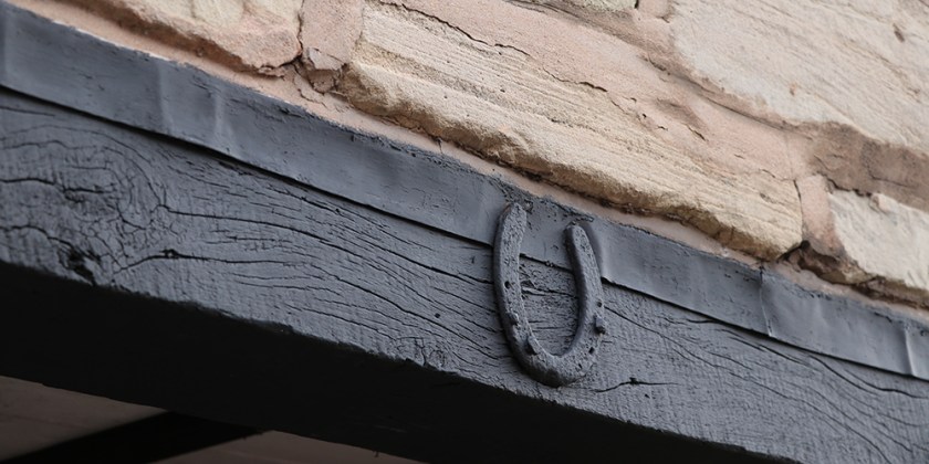 horse-shoe on lintel
