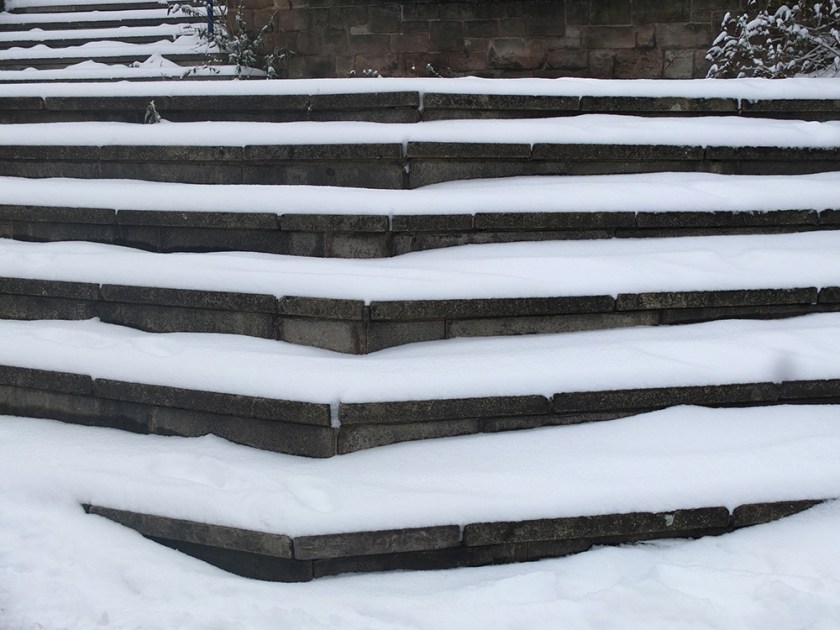 snow settled on outdoor steps