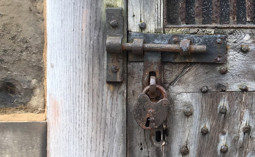 detail of bolt and padlock