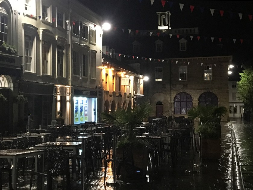 Rainy night. Empty pavement café 