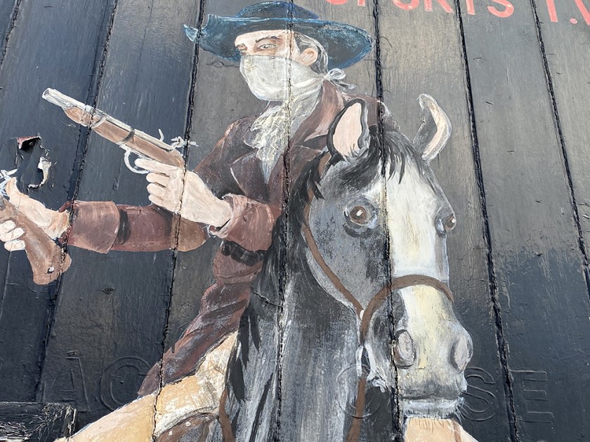 highwayman on horse. Painted pub door
